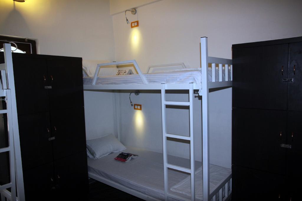 Wanderers Hostel Morjim Kamer foto